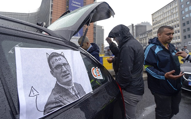 Таксисты всего мира протестуют против сервиса Uber Таксисты всего мира протестуют против сервиса Uber