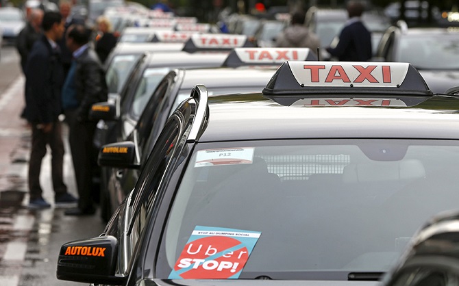 Таксисты всего мира протестуют против сервиса Uber Таксисты всего мира протестуют против сервиса Uber
