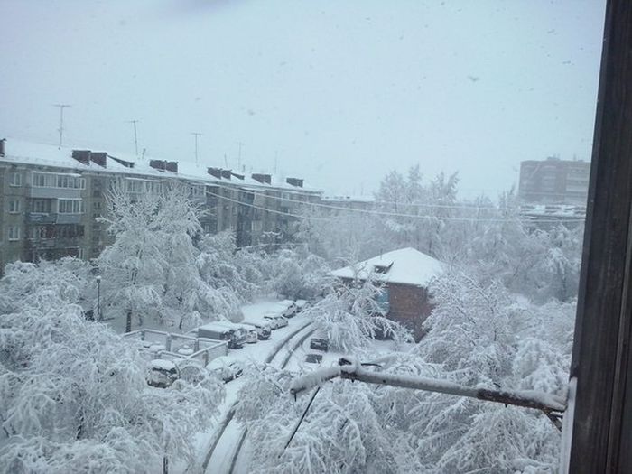 Последствия сильного снегопада в Красноярске