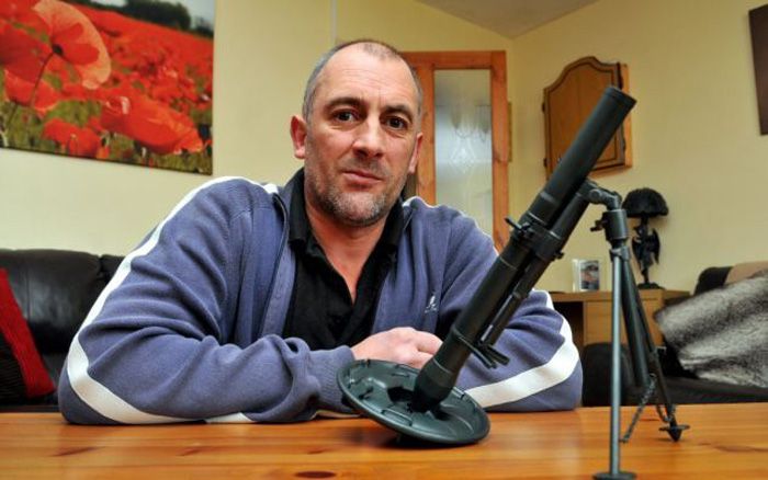 Полиция приехала на обыск из-за фотографии на Фейсбуке (2 фото)