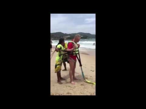 Сорвался с парашюта в воду и убился